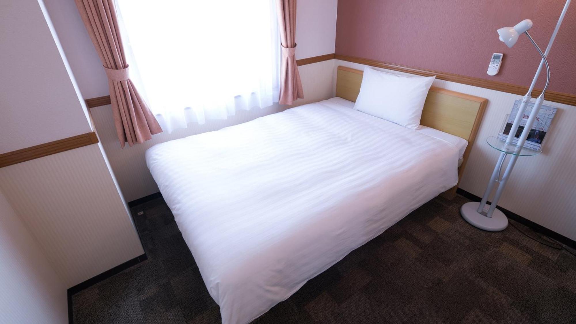 Toyoko Inn Nagoya Owari Ichinomiya Ekimae Rum bild