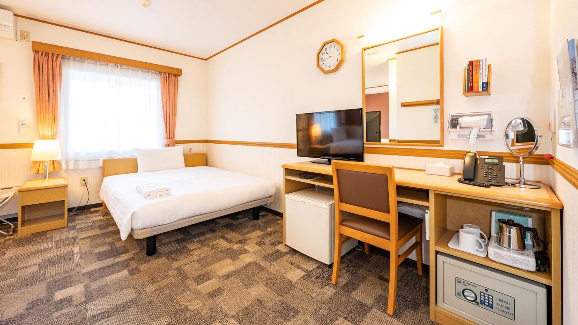 Toyoko Inn Nagoya Owari Ichinomiya Ekimae Rum bild